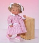 poupee Cuco robe rose et blanche