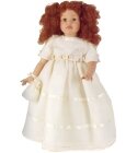 Poupee Elia dans sa robe de communion beige