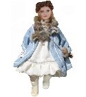 poupee Poupée de porcelaine assise manteau bleu